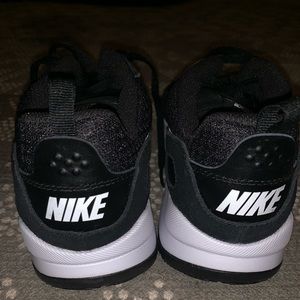 Black Nike running shoes